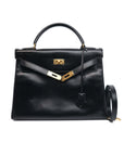 Kelly 32 Noir GHW Retourne Box Leather